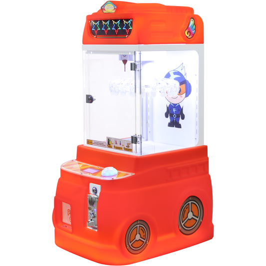 A bright orange and clip machine with a clear glass front, featuring a cartoon character graphic on the display window, a control panel with buttons, and a coin slot on the front base.