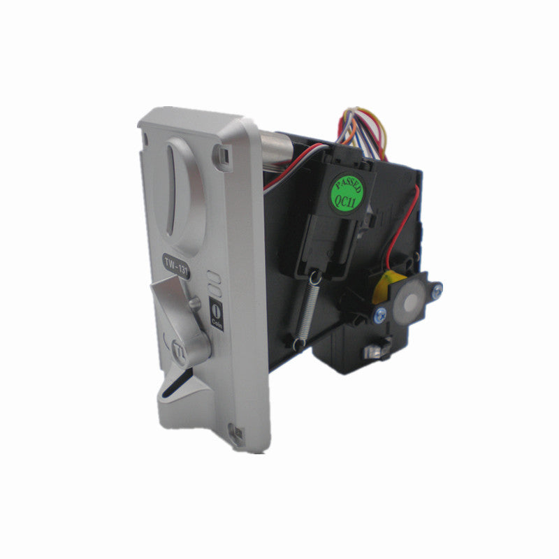 TW131 coin selector side view showing internal mechanism and QC sticker | Hiclawcrane